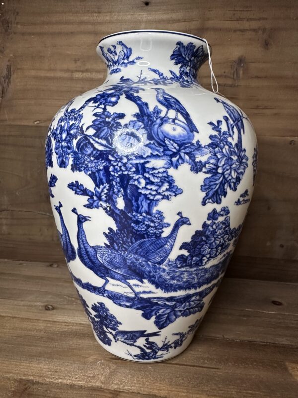 BLUE AND WHITE GLAZED PEACOCK VASE